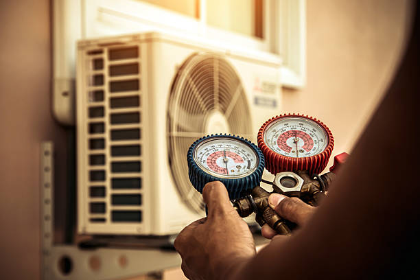 Professional Hvac technician working in Island Lake, IL
